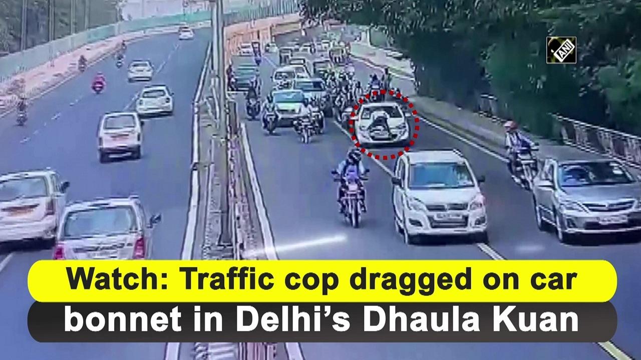 watch-traffic-cop-dragged-on-car-bonnet-in-delhis-dhaula-kuan