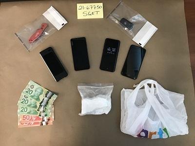Partial brick of suspected cocaine seized by SGET - https://cdn.connectfm.ca/99CE6727-290A-4483-97E7-5C706E583178_Story1191609_1727688.jpg