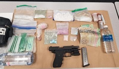 Loaded firearm and drugs seized from man and woman during arrest  - https://cdn.connectfm.ca/A85FA3AB-1105-49FB-8B95-79B22502377B_Story1189520_1724704.jpg
