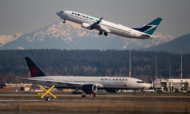 Watchdog recommends up to 100% foreign airline ownership amid low competition - https://cdn.connectfm.ca/Air-canada_2025-06-19-141833_ahqz.jpg
