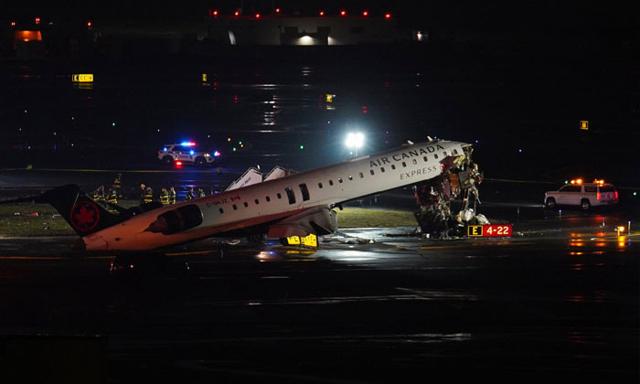 Two pilots dead after Air Canada Express aircraft collides with fire truck at LaGuardia Airport - https://cdn.connectfm.ca/Air-canada_2026-03-23-142024_qvey.jpg
