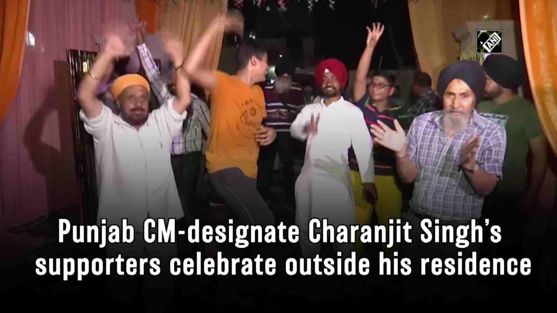 charanjit-singhs-supporters-celebrate-outside-his-residence