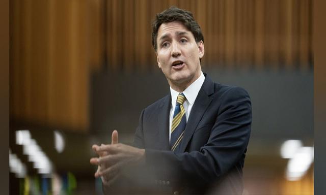 Alberta’s Danielle Smith not putting ‘Canada first’ by refusing to sign Trump tariff plan, Trudeau says - https://cdn.connectfm.ca/Justin-Trudeau_2024-06-12-164639_lnxo.jpg