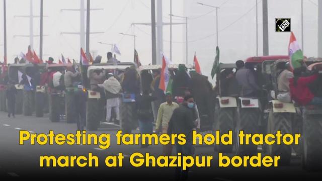 Protesting farmers hold tractor march at Ghazipur border - https://cdn.connectfm.ca/Tractor-March.jpg