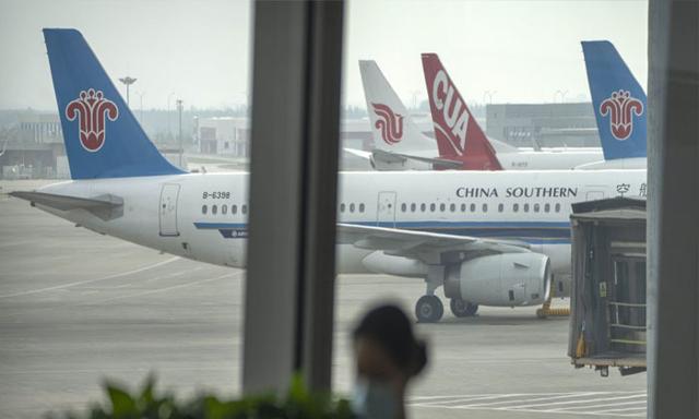 Ottawa approves gradual increase in direct passenger, cargo flights with China - https://cdn.connectfm.ca/air-line.jpg