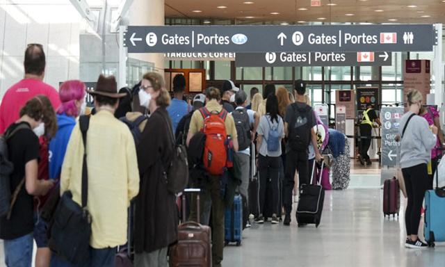 Supreme Court upholds stronger compensation rules for Canadian air passengers on international flights - https://cdn.connectfm.ca/gate-portes.jpg