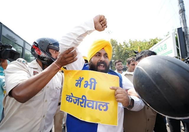 The police took Minister Harjot Bains into custody - https://cdn.connectfm.ca/harjot-singh-bains.jpg