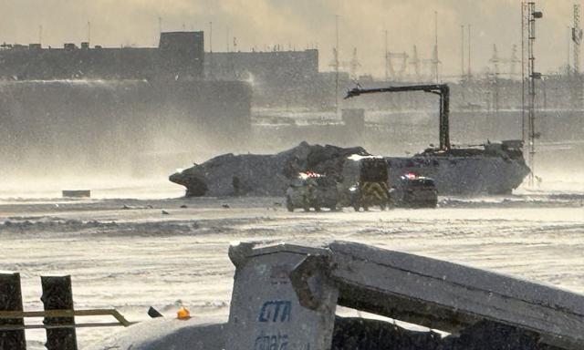 Delta plane crashes and flips upside down at Toronto airport - https://cdn.connectfm.ca/plain_2025-02-18-165835_jizl.jpg