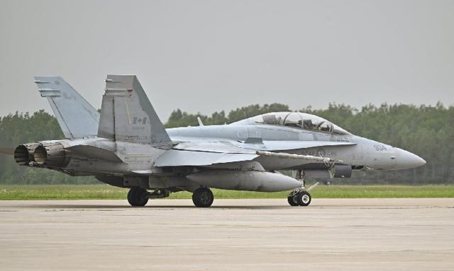 CF-18 jets intercept plane violating restricted air space above G7 site in Alberta - https://cdn.connectfm.ca/plane_2025-06-16-134318_pnvk.jpg