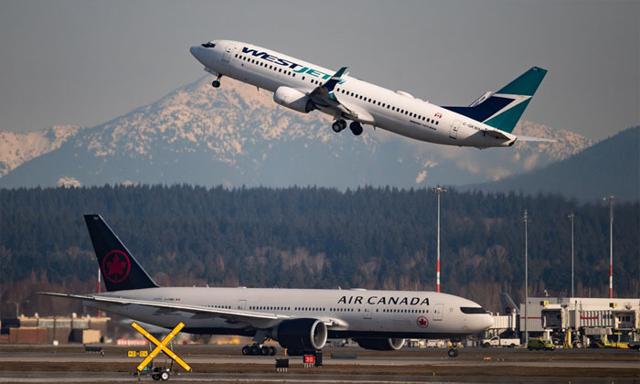 Vancouver airport reports record passenger traffic and cargo volumes in 2025 - https://cdn.connectfm.ca/westjet_2026-02-03-174104_qbeu.jpg