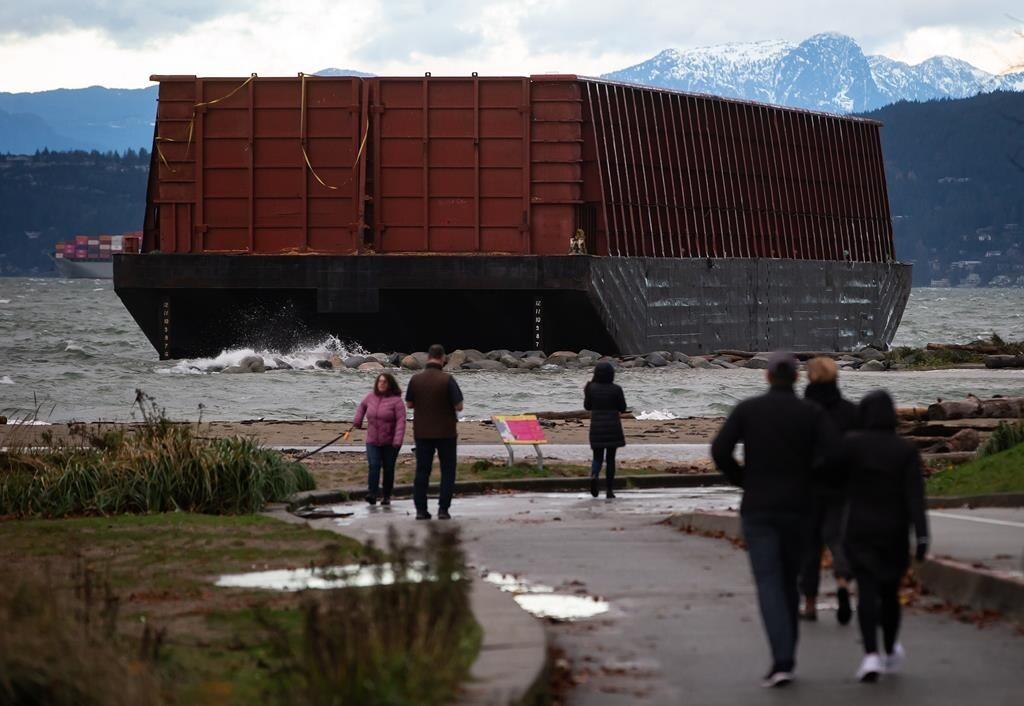 salvage-work-begins-to-remove-barge-stuck-for-months-on-vancouver-beach