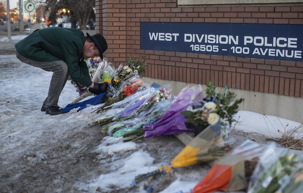 procession-for-hundreds-lined-up-on-streets-in-edmonton-as-bodies-of-two-slain-cops-transported-to-funeral-home